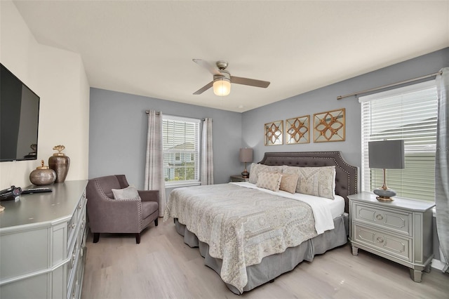 8940 Zurich Ln, Kissimmee, FL 34747 - bedroom featuring light wood-style floors and a ceiling fan