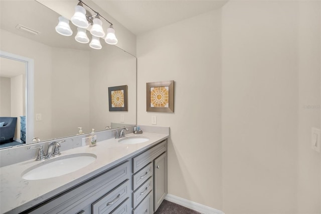 8940 Zurich Ln, Kissimmee, FL 34747 - bathroom featuring double vanity and connected bathroom