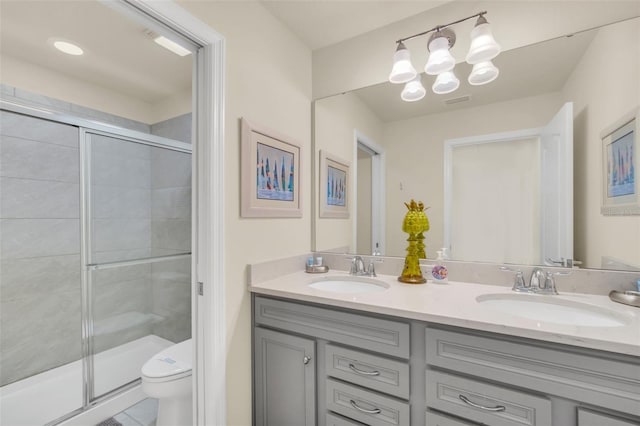 8940 Zurich Ln, Kissimmee, FL 34747 - full bathroom featuring double vanity, a stall shower, and tile patterned floors