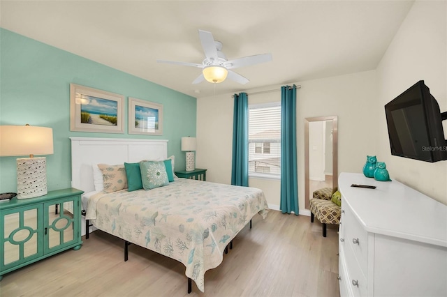8940 Zurich Ln, Kissimmee, FL 34747 - bedroom featuring light wood-style floors and a ceiling fan