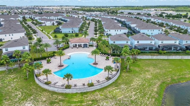8940 Zurich Ln, Kissimmee, FL 34747 - aerial view of residential area with a pool area and a nearby body of water