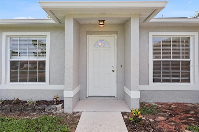 1742 Van Allen Cir, Deltona, FL 32738 - view of exterior entry with stucco siding
