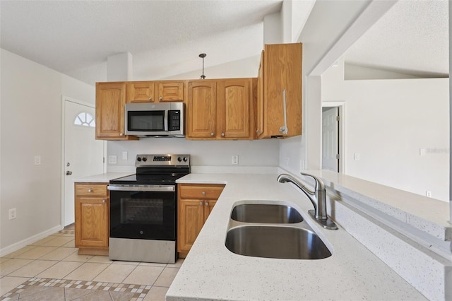 1742 Van Allen Cir, Deltona, FL 32738 - kitchen with appliances with stainless steel finishes, lofted ceiling, light tile patterned floors, brown cabinets, and light stone counters