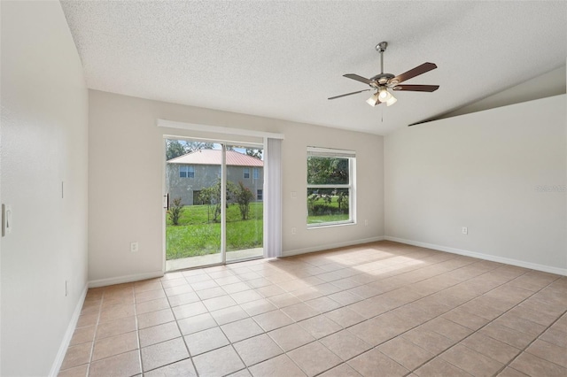 1742 Van Allen Cir, Deltona, FL 32738 - unfurnished room with light tile patterned floors, ceiling fan, a textured ceiling, and lofted ceiling