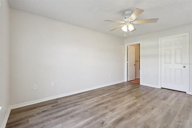 1742 Van Allen Cir, Deltona, FL 32738 - unfurnished bedroom with wood finished floors and a ceiling fan