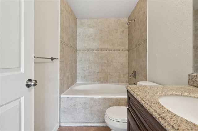 1742 Van Allen Cir, Deltona, FL 32738 - bathroom with vanity, tiled shower / bath combo, and tile patterned flooring