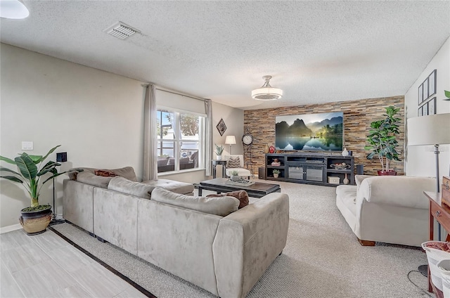 569 Yearling Cove Loop, Apopka, FL 32703 - living area featuring a textured ceiling