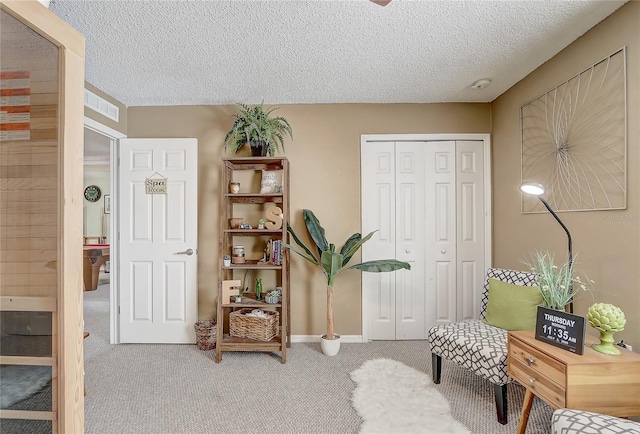 569 Yearling Cove Loop, Apopka, FL 32703 - sitting room featuring carpet and a textured ceiling