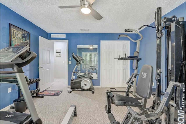 569 Yearling Cove Loop, Apopka, FL 32703 - exercise area featuring ceiling fan, a textured ceiling, and carpet floors