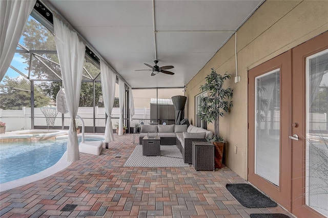 569 Yearling Cove Loop, Apopka, FL 32703 - sunroom / solarium featuring a hot tub, a ceiling fan, and an outdoor living space