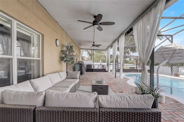 569 Yearling Cove Loop, Apopka, FL 32703 - view of patio / terrace featuring an outdoor hangout area, a ceiling fan, and glass enclosure