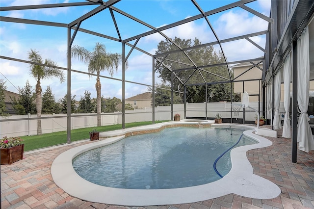 569 Yearling Cove Loop, Apopka, FL 32703 - view of swimming pool with a fenced backyard, a patio, a pool with connected hot tub, and glass enclosure