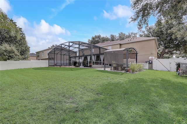 569 Yearling Cove Loop, Apopka, FL 32703 - rear view of house with stucco siding, a fenced backyard, and a patio