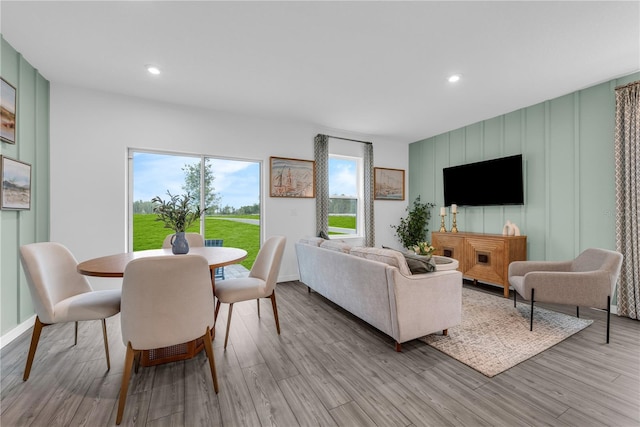 1520 Fan Palm Dr, Davenport, FL 33897 - living area featuring light wood finished floors, recessed lighting, and a decorative wall