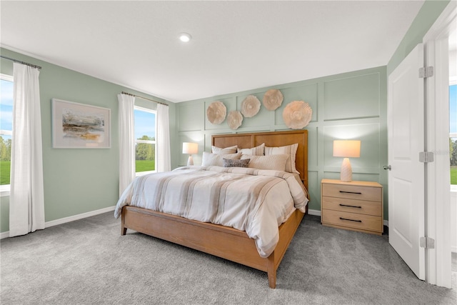 1520 Fan Palm Dr, Davenport, FL 33897 - bedroom with carpet flooring and a decorative wall