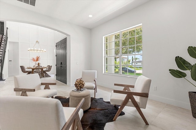 619 Largovista Dr, Oakland, FL 34787 - sitting room with a chandelier, arched walkways, and recessed lighting