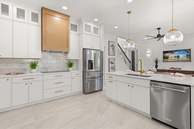 619 Largovista Dr, Oakland, FL 34787 - kitchen with stainless steel appliances, ceiling fan, light countertops, decorative backsplash, and recessed lighting