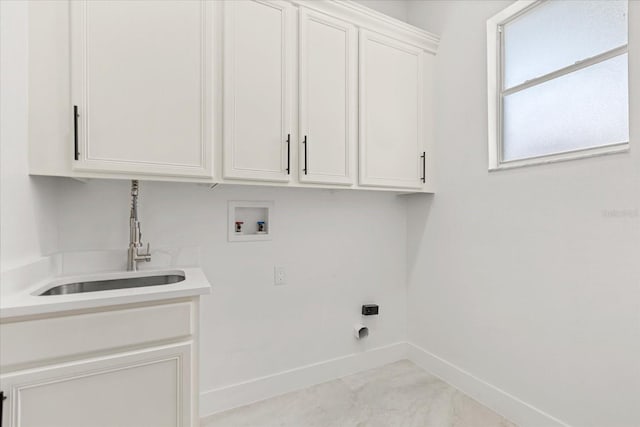 619 Largovista Dr, Oakland, FL 34787 - laundry room featuring hookup for a washing machine, cabinet space, hookup for an electric dryer, and marble look tiles
