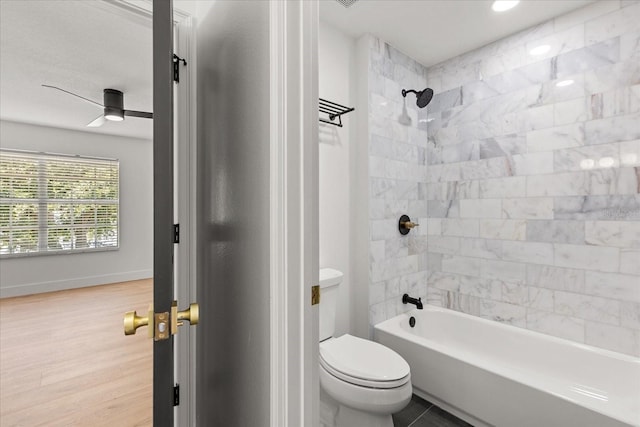 619 Largovista Dr, Oakland, FL 34787 - full bath featuring shower / bathtub combination, wood finished floors, and a ceiling fan