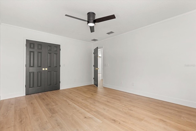 619 Largovista Dr, Oakland, FL 34787 - empty room featuring ceiling fan, ornamental molding, and light wood-style floors