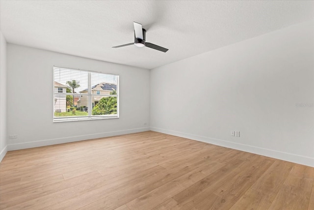 619 Largovista Dr, Oakland, FL 34787 - unfurnished room with light wood-type flooring, ceiling fan, and a textured ceiling