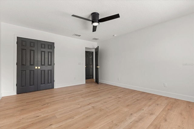 619 Largovista Dr, Oakland, FL 34787 - unfurnished bedroom with light wood-style flooring and ceiling fan