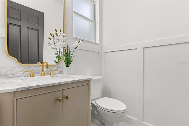 619 Largovista Dr, Oakland, FL 34787 - half bathroom featuring toilet and vanity