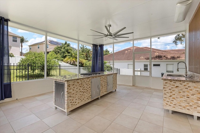 619 Largovista Dr, Oakland, FL 34787 - unfurnished sunroom featuring a ceiling fan and an outdoor kitchen