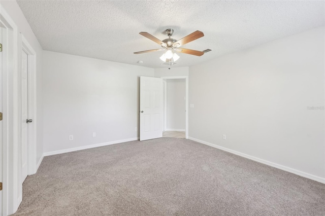 1082 Worthington Dr, Deltona, FL 32738 - unfurnished bedroom with carpet floors, a textured ceiling, and ceiling fan