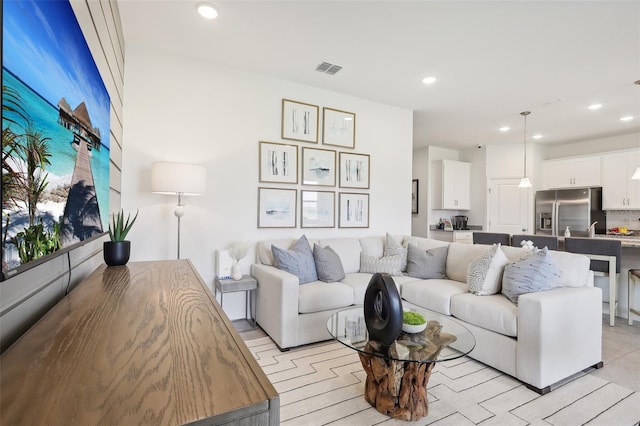 1275 Normandy Dr, Haines City, FL 33844 - living room featuring recessed lighting