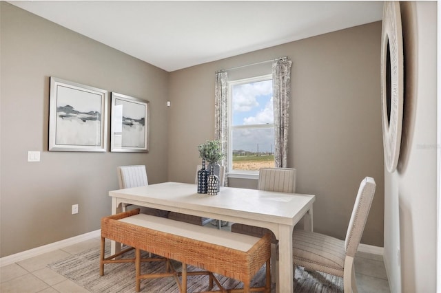 1275 Normandy Dr, Haines City, FL 33844 - dining space with baseboards and light tile patterned floors