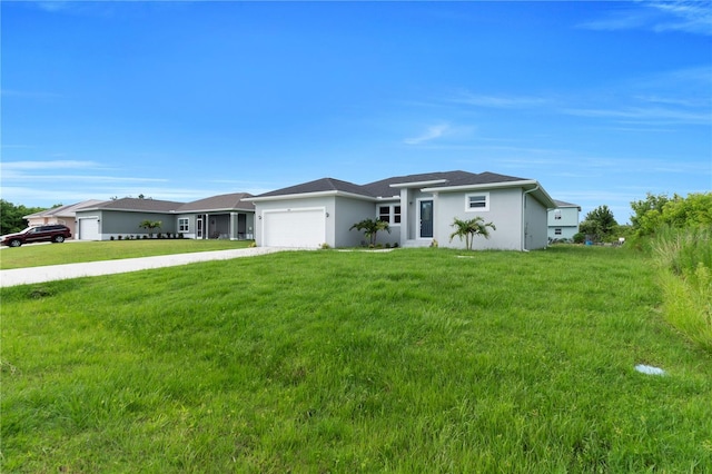 9333 Hialeah Ter, Port Charlotte, FL 33981 - view of front of house with driveway, an attached garage, a front lawn, and stucco siding