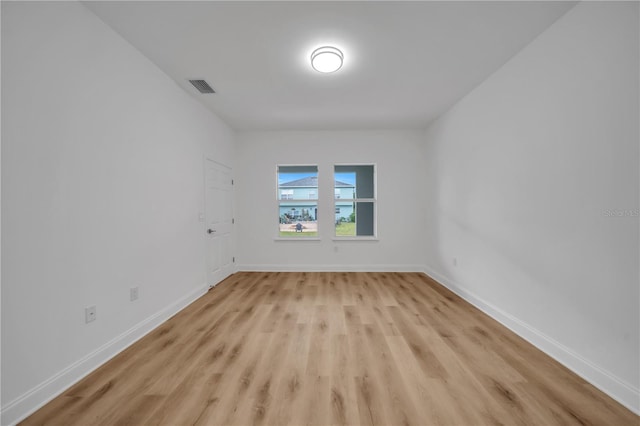 9333 Hialeah Ter, Port Charlotte, FL 33981 - spare room featuring light wood-style floors and baseboards