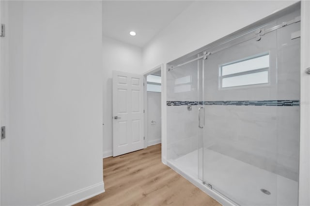 9333 Hialeah Ter, Port Charlotte, FL 33981 - full bathroom featuring a stall shower, wood finished floors, and recessed lighting