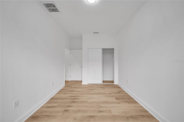 9333 Hialeah Ter, Port Charlotte, FL 33981 - unfurnished bedroom featuring light wood-style flooring and a closet