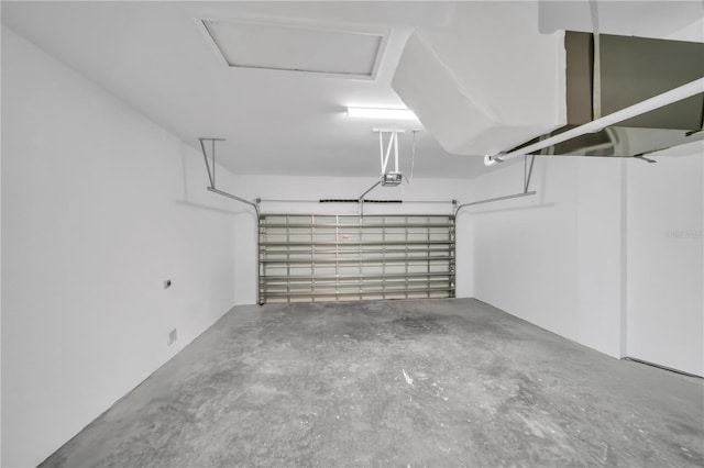 9333 Hialeah Ter, Port Charlotte, FL 33981 - garage featuring a garage door opener