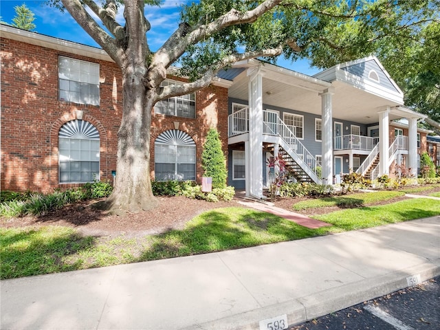 5421 Lake Margaret Dr Unit 178, Orlando, FL 32812 - view of building exterior featuring stairway