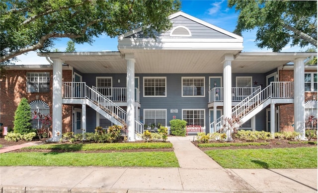 5421 Lake Margaret Dr Unit 178, Orlando, FL 32812 - view of building exterior with stairway