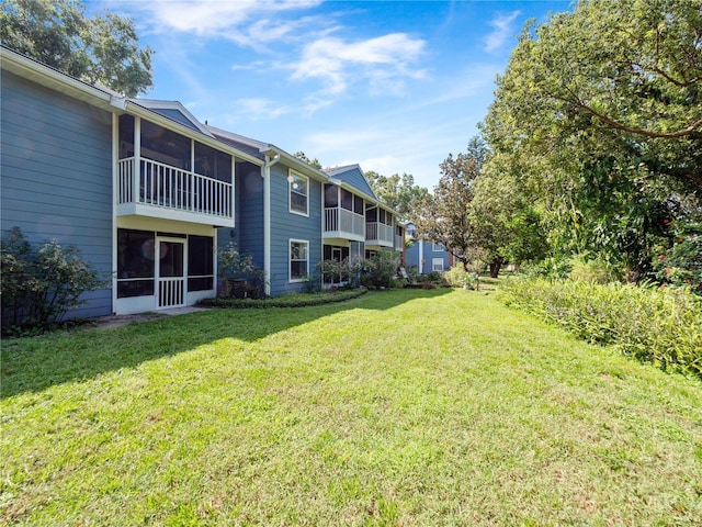 5421 Lake Margaret Dr Unit 178, Orlando, FL 32812 - view of green lawn with a sunroom