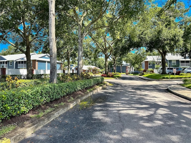 5421 Lake Margaret Dr Unit 178, Orlando, FL 32812 - view of asphalt street with a residential view and curbs