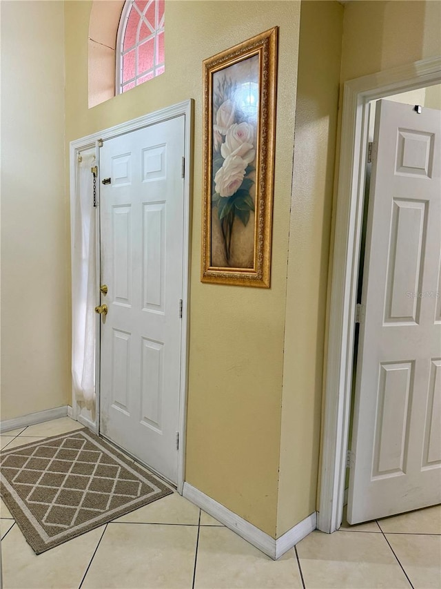 1945 Torrey Dr, Orlando, FL 32818 - foyer featuring light tile patterned floors