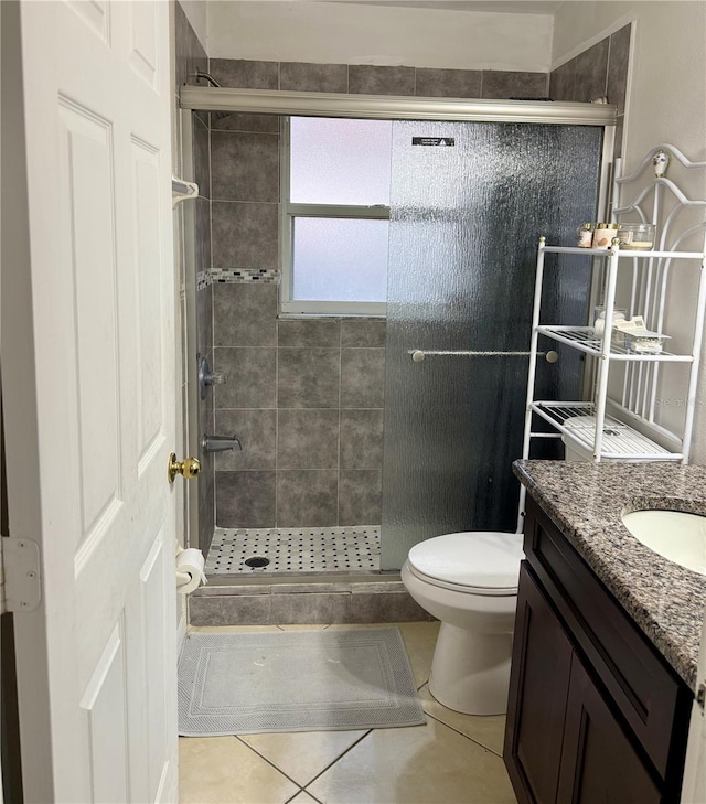 1945 Torrey Dr, Orlando, FL 32818 - bathroom with tile patterned flooring, a stall shower, and vanity