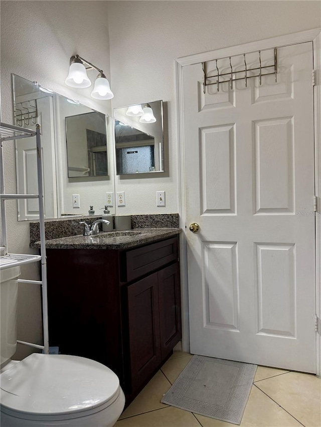 1945 Torrey Dr, Orlando, FL 32818 - bathroom featuring tile patterned floors and vanity
