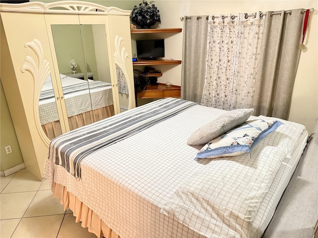 1945 Torrey Dr, Orlando, FL 32818 - bedroom featuring tile patterned floors