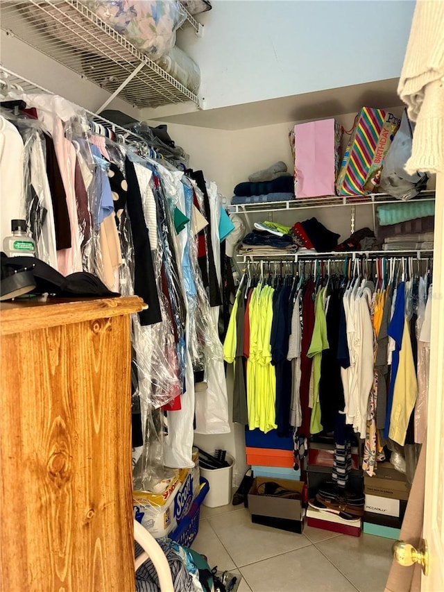 1945 Torrey Dr, Orlando, FL 32818 - walk in closet featuring tile patterned floors