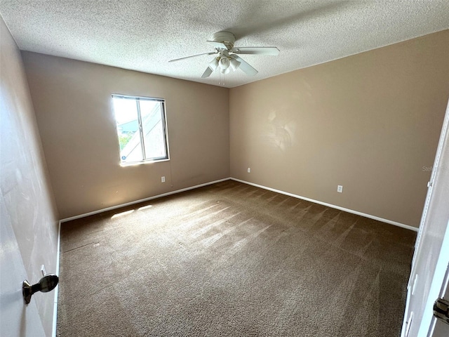 5359 Vineland Rd Unit S, Orlando, FL 32811 - empty room with ceiling fan, dark carpet, and a textured ceiling