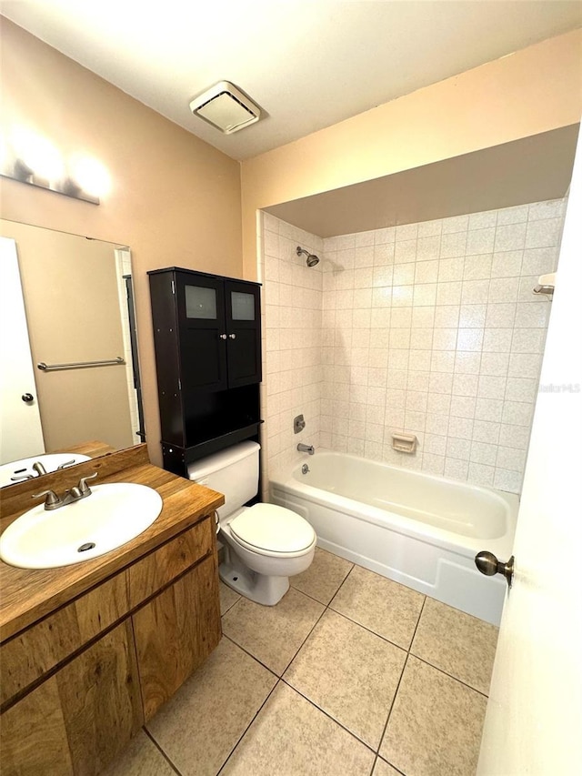 5359 Vineland Rd Unit S, Orlando, FL 32811 - full bathroom featuring tile patterned floors, vanity, and washtub / shower combination