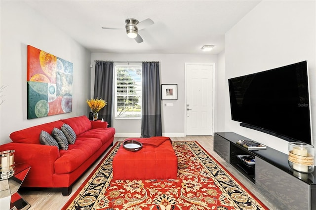14241 Confetti Dr, Windermere, FL 34786 - living area with wood finished floors and a ceiling fan