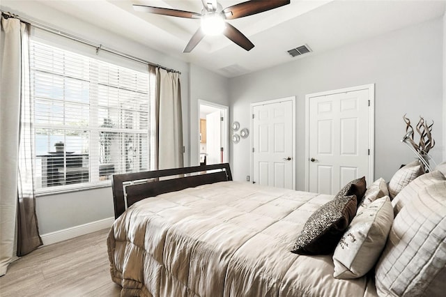 14241 Confetti Dr, Windermere, FL 34786 - bedroom featuring light wood finished floors and ceiling fan