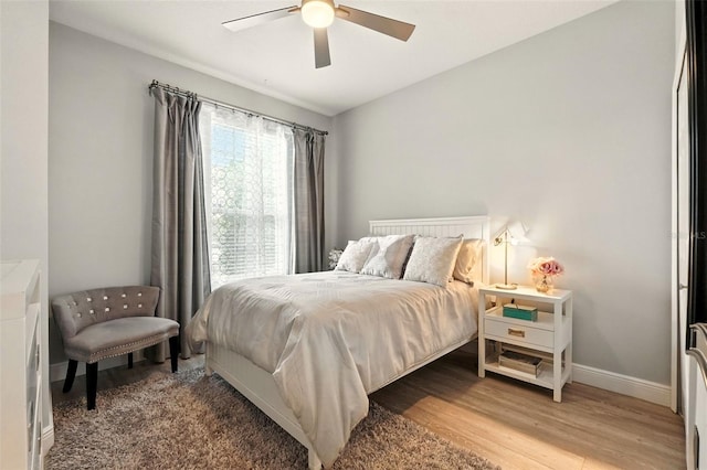 14241 Confetti Dr, Windermere, FL 34786 - bedroom featuring light wood finished floors and ceiling fan
